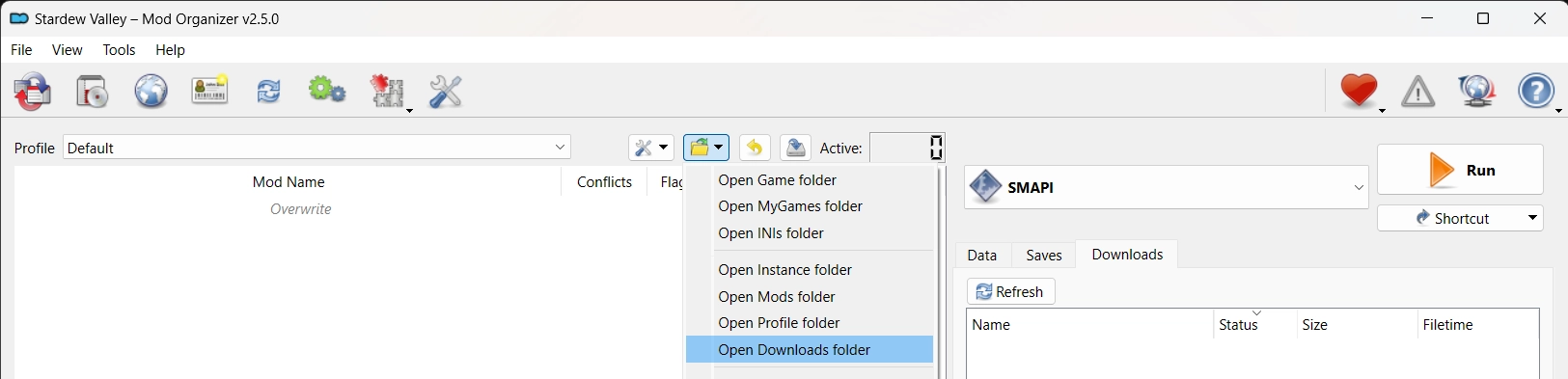 The Mod Organizer 2 UI showing the button to open the download folder